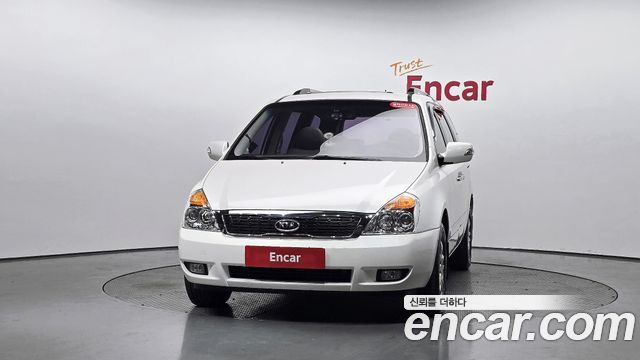 Kia Canival 2012 — photo 3
