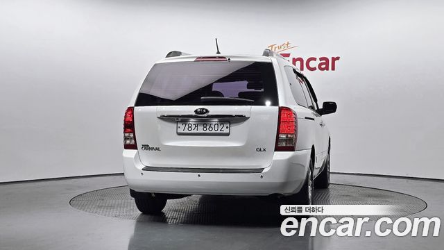 Kia Canival 2012 — photo 4