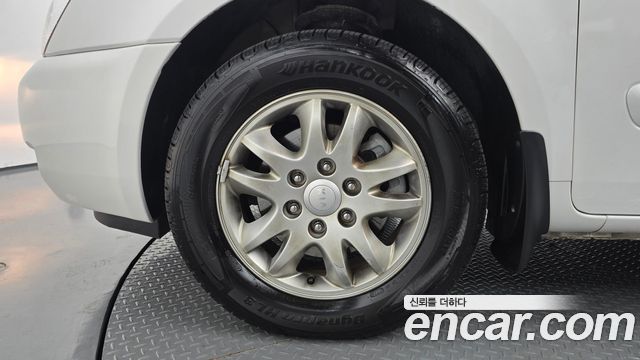 Kia Canival 2012 — photo 5