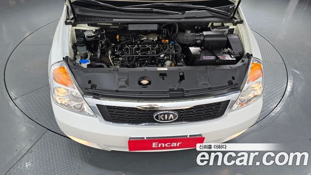 Kia Canival 2012 — photo 6