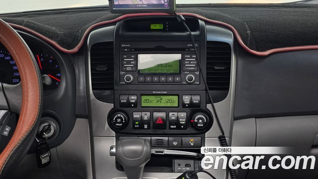 Kia Canival 2012 — photo 24
