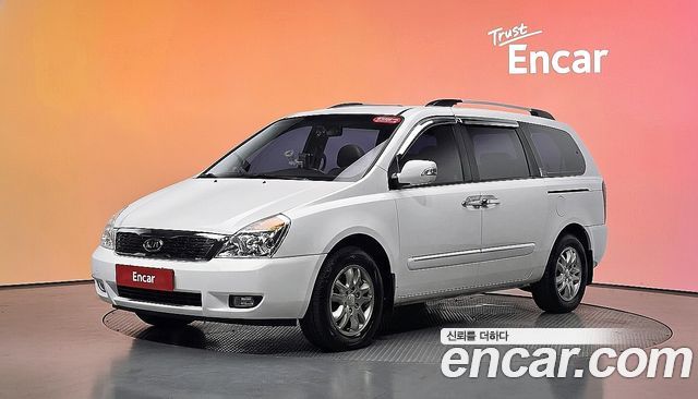 Kia Canival 2012 — photo 1