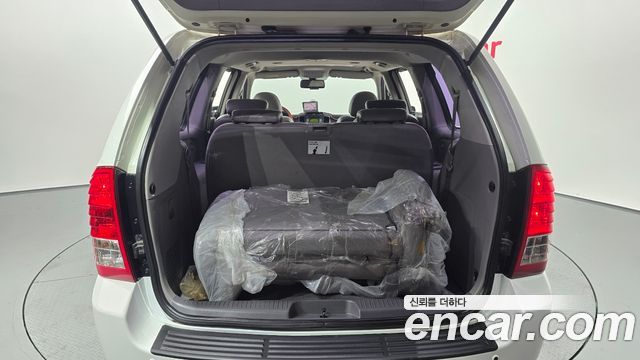 Kia Canival 2012 — photo 30
