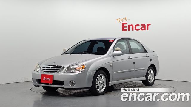 Kia Cerato 2005 — photo 1