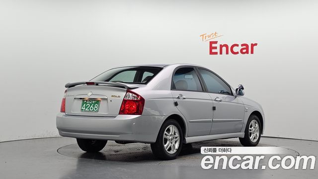 Kia Cerato 2005 — photo 2