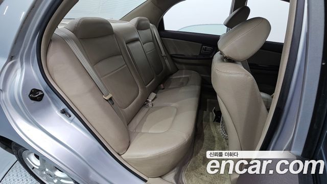 Kia Cerato 2005 — photo 11
