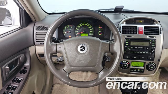 Kia Cerato 2005 — photo 13
