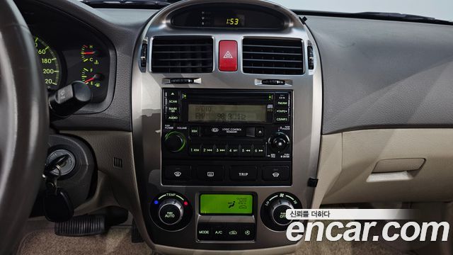 Kia Cerato 2005 — photo 14