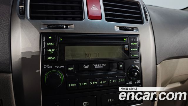Kia Cerato 2005 — photo 15