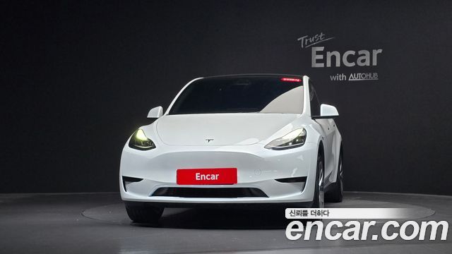 Tesla Model Y 2024 — photo 3