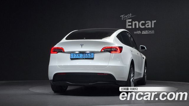 Tesla Model Y 2024 — photo 4