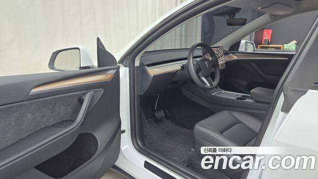 Tesla Model Y 2024 — photo 13