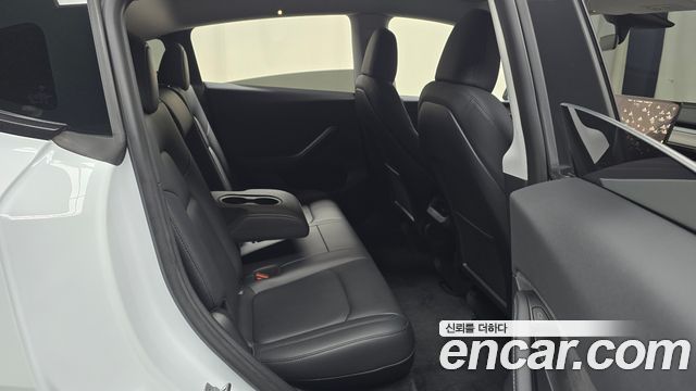 Tesla Model Y 2024 — photo 17