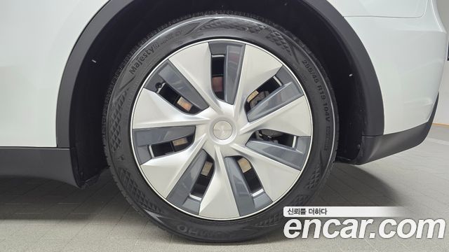 Tesla Model Y 2024 — photo 7