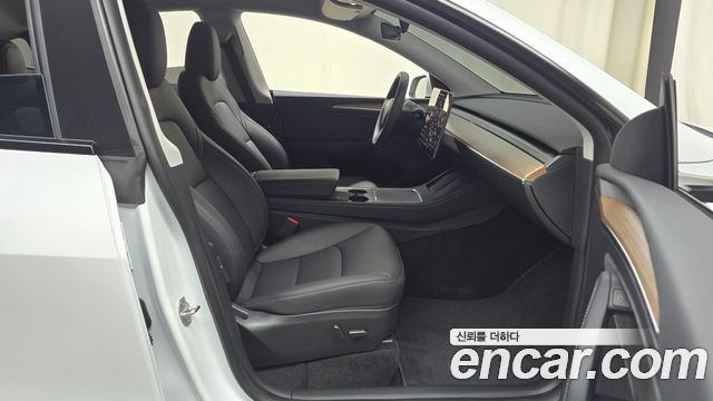Tesla Model Y 2024 — photo 16