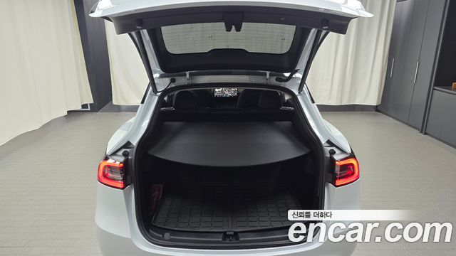 Tesla Model Y 2024 — photo 28