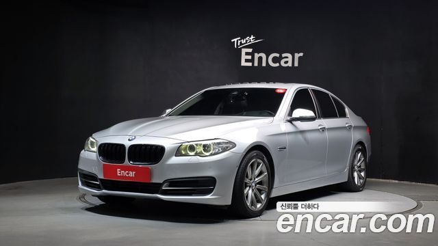 BMW 5-Series 2014 — photo 1