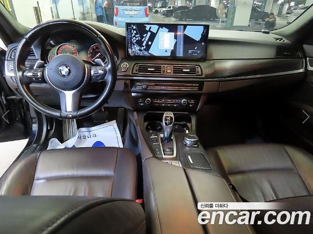 BMW 5-Series 2016 — photo 10