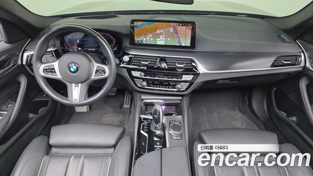 BMW 5-Series 2022 — photo 10
