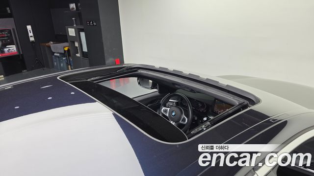 BMW 5-Series 2022 — photo 25