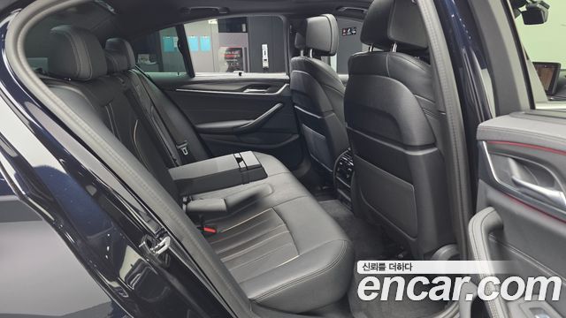 BMW 5-Series 2022 — photo 16