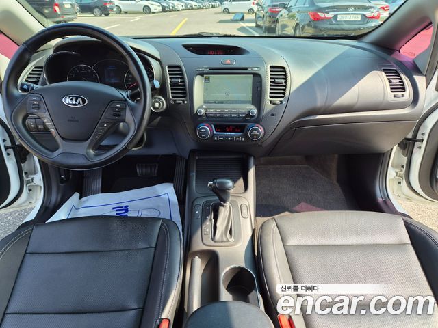 Kia K3 2013 — photo 11