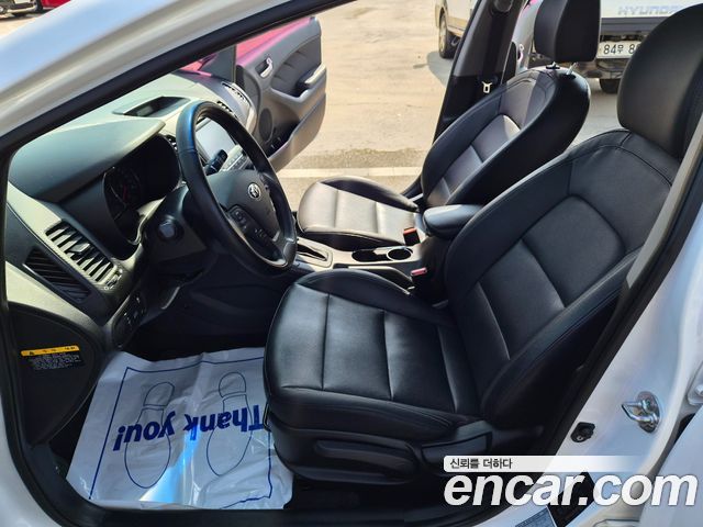 Kia K3 2013 — photo 14