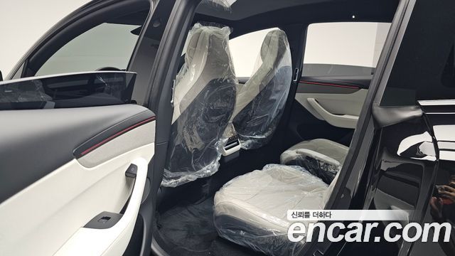 Tesla Model Y 2026 — photo 17