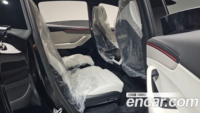 Tesla Model Y 2026 — photo 18