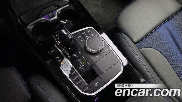 BMW 1-Series 2023 — photo 12