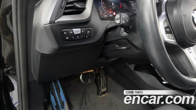 BMW 1-Series 2023 — photo 23