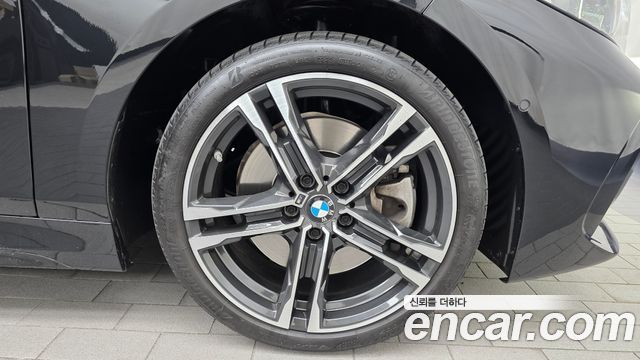 BMW 1-Series 2023 — photo 7