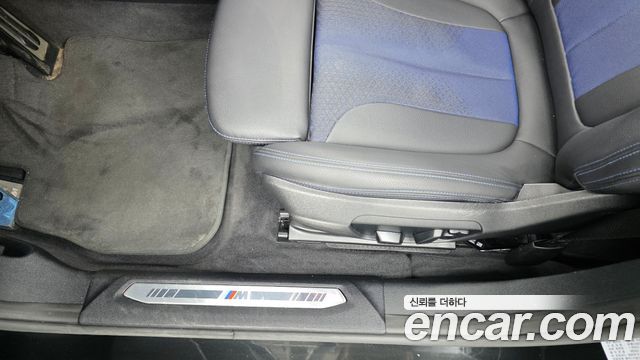 BMW 1-Series 2023 — photo 31