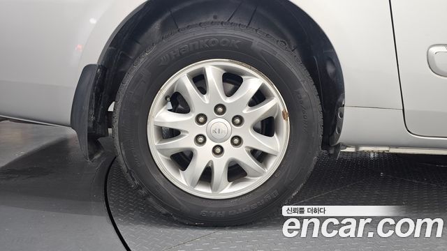 Kia Canival 2012 — photo 5