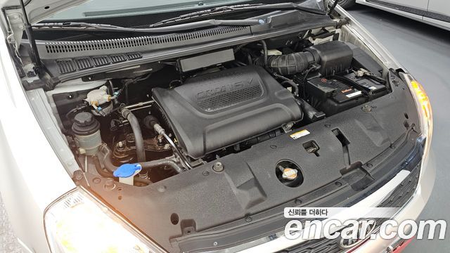 Kia Canival 2012 — photo 6