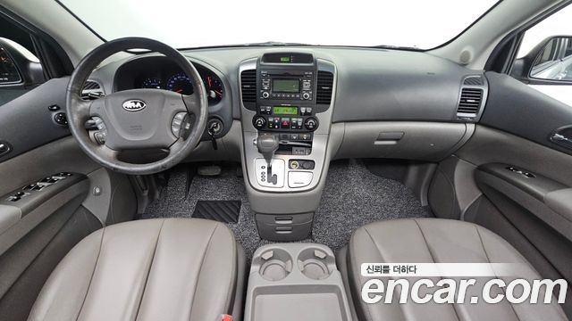 Kia Canival 2012 — photo 10