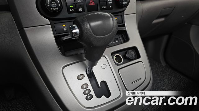 Kia Canival 2012 — photo 12