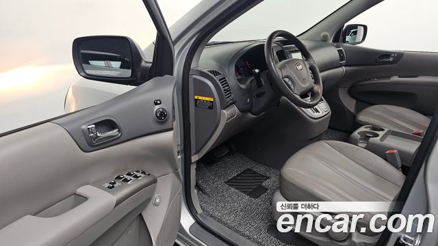 Kia Canival 2012 — photo 13