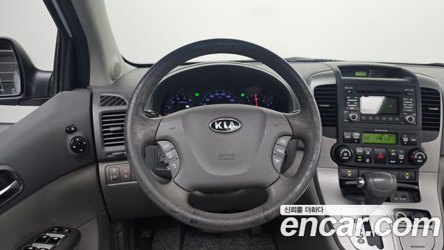 Kia Canival 2012 — photo 18
