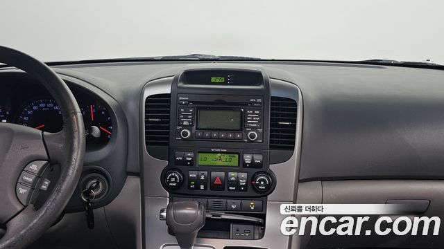 Kia Canival 2012 — photo 19