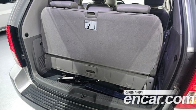 Kia Canival 2012 — photo 26