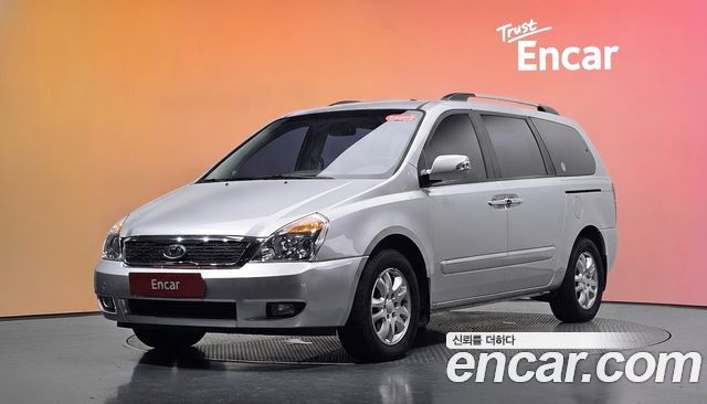Kia Canival 2012 — photo 1