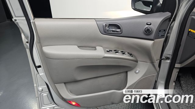 Kia Canival 2012 — photo 15