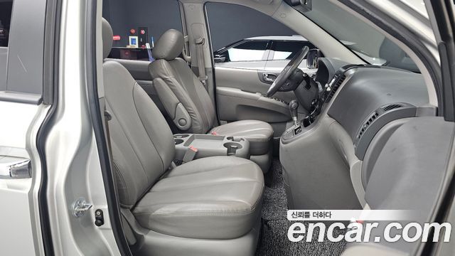 Kia Canival 2012 — photo 16