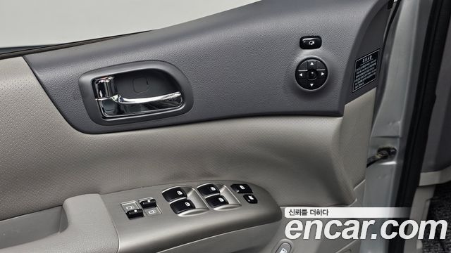 Kia Canival 2012 — photo 30