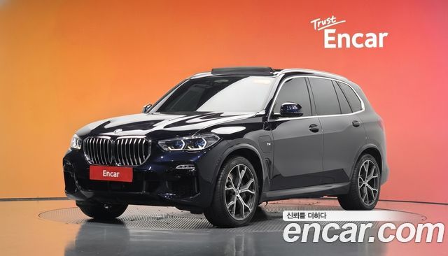BMW X5 2021 — photo 1