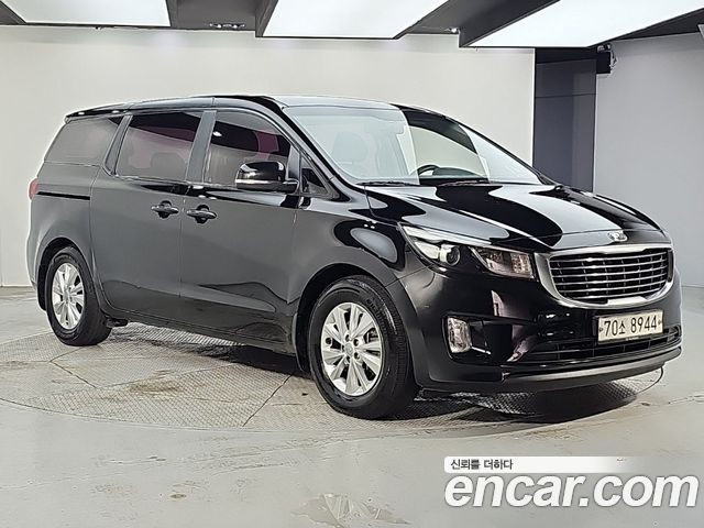 Kia Canival 2015 — photo 2
