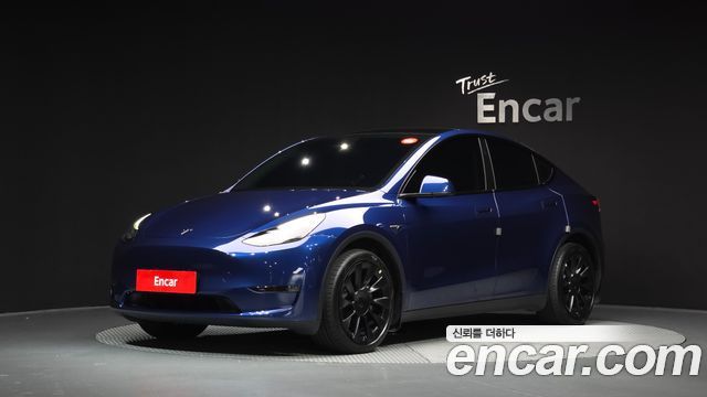 Tesla Model Y 2024 — photo 1