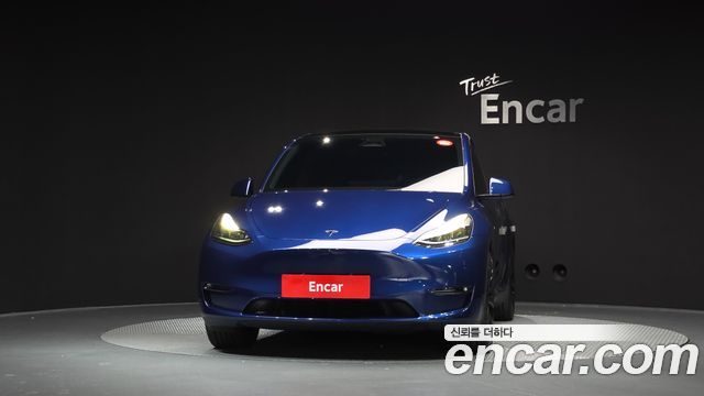 Tesla Model Y 2024 — photo 3