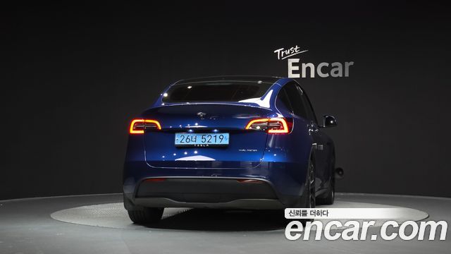 Tesla Model Y 2024 — photo 4